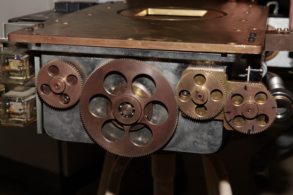 Close-up of industrial gears and drive components